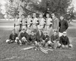 St. Mary's County, Maryland, circa 1920. "Charlotte Hall Military Academy baseball." Harris &amp; Ewing Collection glass negative. View full size.
Too Tony for Rocky?Apparently, Stallone (Sylvester) attended in 1961, but didn't graduate.
I&#039;ve got a thingfor the guy fourth from the left in back. Wowza. Cuuuute.
Another gangAnother bunch of guys hanging around, all dressed pretty much alike, and with baseball bats. Look out !
All the better to hear you with, my dear.I think someone needs to do a study of ears, their size, and how much they stick out.  Maybe its just the hairstyles, but these ears are, well, awesome.
That BatSpalding Autograph, with the signature of Frank M. Schulte.
Wildfire!The story on Frank Schulte from "Fifteen Seasons in the Bigs (1904-1918)":
In 1908 he saw Lillian Russell perform in a play called "Wildfire" and thereafter named a trotter he raced in the offseason by the same name. Sportswriters picked it up and started calling Schulte "Wildfire," too. The name stuck and his playing lived up to it. His arm was considered the strongest of the deadball era; he stole home 22 times and his career BA was a decent .270. Wildfire!
Toasty and WarmGotta love those sweaters!
RSVP ASAPThe alumni reunion is this Saturday. However, attendance may be light, as the last cadets graduated almost 35 years ago. http://www.chma.org/
Charlotte Hall, not just a town of sluggers Any observer of today's mass market music (viz., popular with folks under 30) would know that the successful band Good Charlotte hails from near the same part of Maryland, from Waldorf, specifically.   
Giants fanThe gent in the back row, second from right, is sporting a New York Giants ballcap.  He'll be happy in about a year when the Giants beat the Yankees in the '21 World Series.
Lousy EquipmentAlthough the first baseball gloves were fingerless and had no padding, the gloves and the mitt that are shown are hardly ergonomic and are pathetic even by the standards of my day and certainly by today's standards.
I wonder what professional baseball would look like if the current players were forced to use the equipment shown here.
It probably wouldn't look very impressive for at least a few games.
(The Gallery, Harris + Ewing, Sports)