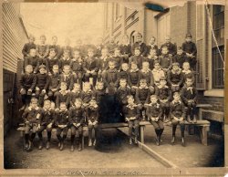 I bought this photo at a flea market at the Alabama State Fairgrounds sometime in the seventies. It is a school class picture taken presumably in 1892. I have been intrigued with the photo since I first saw it. Where is Overhill St School? Why was the lady on the first row defaced? What do you think fellow Shorpyites? View full size.
What lady?I see the remains of an unsettled spirit.
School locationThe Jefferson County Public School System website lists "Overhill Street School" as an elementary school that closed in 1911,in Louisville. Some further searches indicate that the school was replaced in 1911 by the Broadway School.
Thanks Harold!Thanks for the info!
School LocationOverhill Street was changed to Rubel Avenue, so the address is now 639 Rubel Avenue, Louisville, Kentucky.
(ShorpyBlog, Member Gallery)