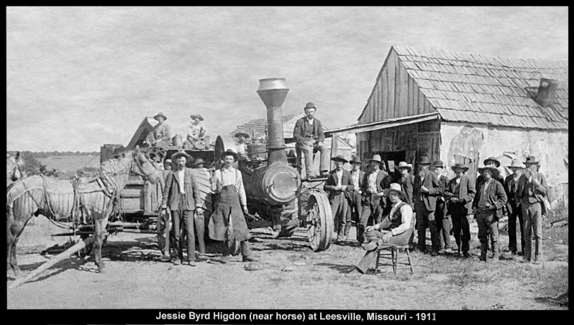 Jesse B. Higdon, standing by horse, showing what appears to be a new threshing machine.  Taken in Leesville, Missouri in 1911. He and family moved to Eureka Springs, Arkansas in 1912 and then to Tulsa, Oklahoma in 1916, where they settled. Scanned from an old photo that has been kept by the family since 1911. Jesse Higdon was my wife's grandfather. View full size
