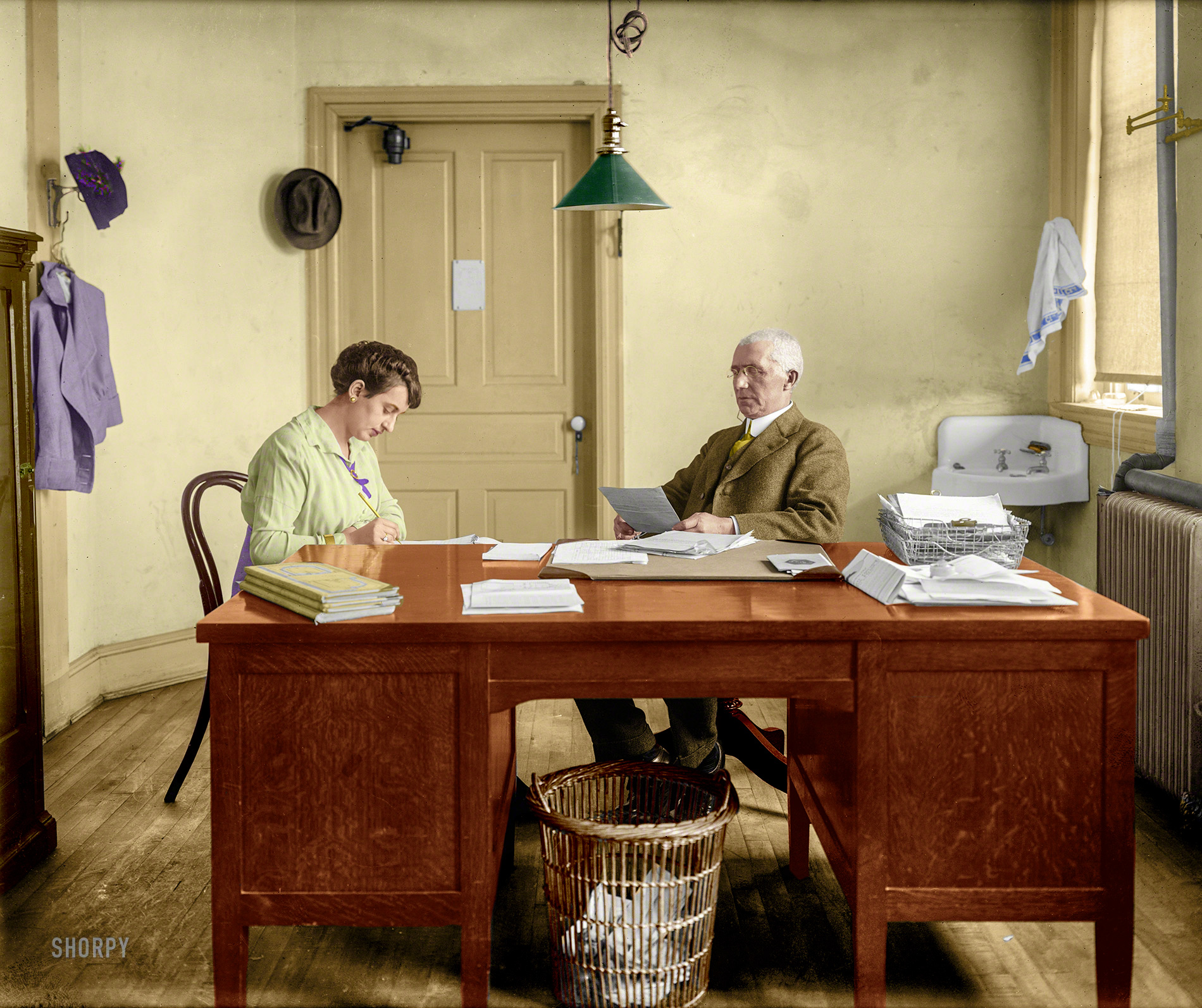 Colorized from this Shorpy original. I love this image. Almost like a play, it spoke to me. The scene is set just like a play. View full size.