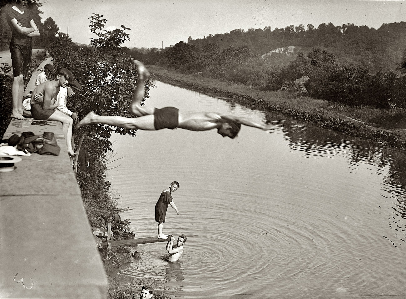 Washington, D.C. (vicinity) circa 1915. "Along the C&O Canal." Last one in's a rotten egg. National Photo Company Collection glass negative. View full size.