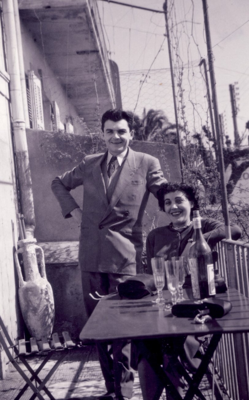 My grandparents lived in Le Havre (France) in 1952. Here they are happy to have an aperitif with a friend (the one who takes the photo). My grandmother Antoinette was born in Corsica in 1917. My grandfather Armand, who was born in Paris in 1921, was director of a cinema in Le Havre, a port city in the North of France. 
