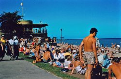 Crowd on Bradford Beach, Milwaukee, Wisconsin.  Picture taken by my father, Everett Harding, on Fourth of July weekend 1954.  Scanned from a Kodachrome transparency. View full size.