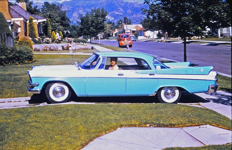 My wife's cousin, Tony Granieri, with his new 1957 Dodge Royal Lancer at his house in Salt Lake City. Tony was a WWII veteran and earned the Purple Heart for injuries to his legs. He was self-conscious about that and never wore shorts the rest of his life. View full size.