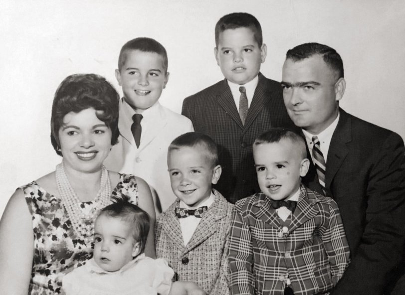 A family photo, circa 1962. I'm the one in the white jacket with my tongue sticking out.  
