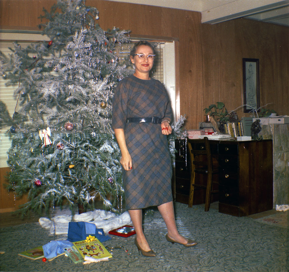 This is the same Christmas as seen here. The lady is unknown. View full size.