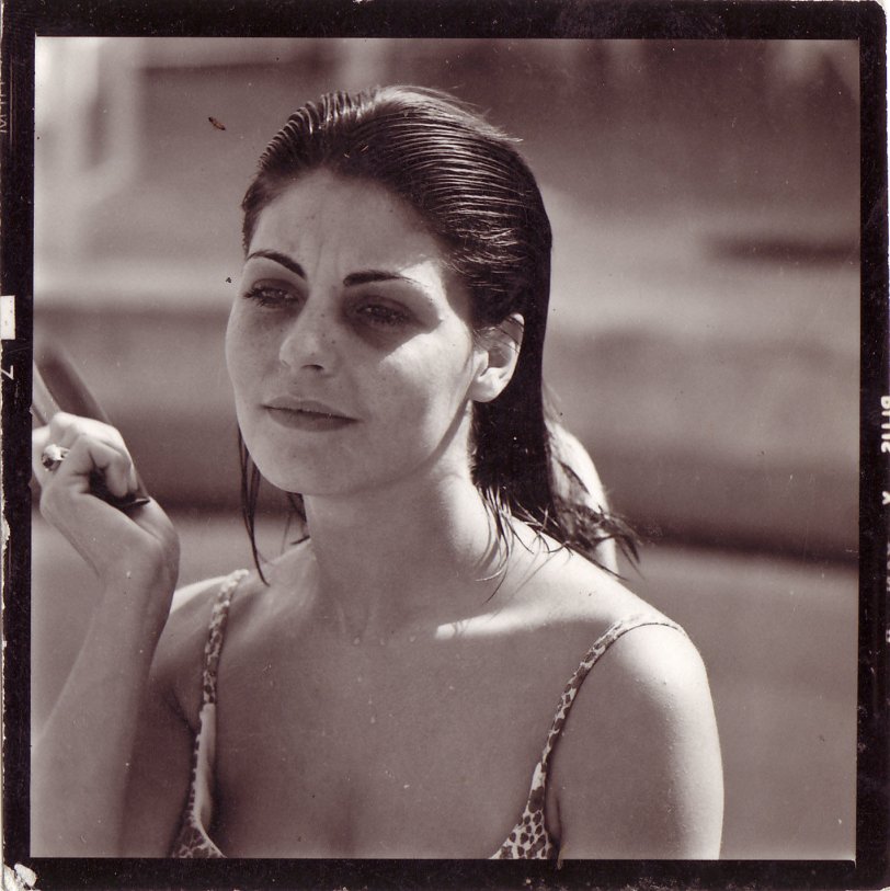My mother is 21 in this photo taken in Toulon (France) in the summer of 1967. 
