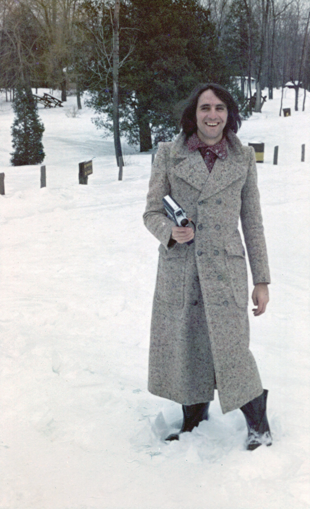 My dad filming in the snow with his super 8mm camera, Toronto, Ontario, January 1971. View full size.