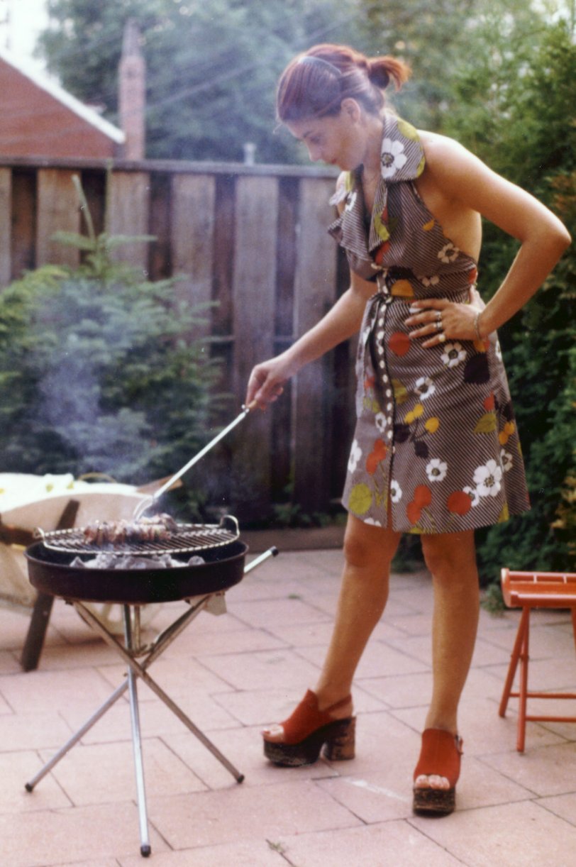 My mother cooking out in the backyard, Toronto, Ontario, July 1973. View full size.

