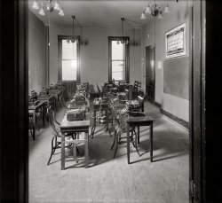 1920. "Washington School for Secretaries. Typing room." Note the Dictaphone in the middle. Harris &amp; Ewing Collection glass negative. View full size.
Alice AdamsThis makes me think of the very depressing end of "Alice Adams" when she has to climb up the stairs to the secretarial school. Now I know why she didn't want to go.
How many songs...Can you get on one of those Dictaphones? Also gives new meaning to the phrase ear-tubes.
Joe from LI, NY
Oh, the noise!My ears are ringing just thinking about how noisy this room must have been when class was in session. I also note that there is one lonely adding machine among all the typewriters. 
Open to Receive Students1920 appears to have been the opening year for the Washington School for Secretaries



(click to enlarge)

Home RowOh how I remember typing class in high school. The symbols were not on the typing keys and you would rely on that old pull-down in front of the class to know where you were, but at exam time the pull-down (like a window blind) would go up and if you didn't know where your home row was or the other letters you may as well leave the room.  Aw ... yes, and that ol' typewriter song comes back to me as well!
Ah, the memories - -of shaving the wax off used Dictaphone cylinders; learning to use the Comptometer (prehistoric adding machine); pounding away on those huge black baby buggies that posed as typewriters; hitting the lever of the work easel to keep the copy at eye level.  Now guess how old I am.  Yech.
WorkhorsesI learned on an adding machine that didn't look that much newer than the model in the picture. And when my father started his business, my mother bought a second-hand (or third- or fourth-hand) typewriter to type his invoices that didn't look all that much younger than the ones here. I bet she's still got it.
I loved my time at WSSI am a 1983 graduate of the WSS (Exec Sec/Admin Assist program) and really enjoyed my year in their program.  The location was 2020 K Street at the time.  Although we had electric typewriters, the classroom was set up just as it was in the 1920 picture above.
1968 WSS graduateI have been looking for info on WSS but never seemed to find anything.  Glad I ran across this.  I attended WSS when it was in the National Press Building.  Was in class there at the time of the 1968 riots in D.C. Good memories and the beginning of a long secretarial career.
Wonder if they still make female students wear hats and gloves?
There you are!I am a 1975 graduate of WSS.  I was very proud of my accomplishments and success at WSS.  I have looked over the years for information about the school.  When did it close and what happened to all of the equipment and pictures.  I remember graduation dance.  
I Will Never Forget!!!!OMG!!!! What a wonderful experience I had in 1982.  I attended WSS when it was on 2020 K St.  What a shock to see that so many others still remember.
Remington # 2, 6, 7Interesting to see this shot on Shorpy, as our theatre company is putting on a production which requires three vintage Remingtons (any of the above models) as they were all "understrike" machines -- the keys hit the paper under the roller rather then the front of the roller. This of course meant that you couldn't see what you were typing. My life as a props buyer this season has been pretty interesting trying to come up with them. I have found two, and need only one more.
1970 Graduate of the WSSThe WSS gave me a firm foundation on which to build my career in the business world.  Excellent training!  At the time I attended, the intense, one-year course was equivalent to a two-year associates degree in business administration at a community college. I shall always remember the hats, heals heels and gloves. Everyone in WDC knew you were a WSS student at one glance.  I attended the school when it was in the National Press Building, a very exciting location and when it was still a privately owned school.  I believe a computer company bought the school the following year.
Washington Secretarial Class of 1958-59I am an honor graduate of the old WSS -- I could do shorthand at 140 and could type on a manual 85 wpm and on an electric easily over 100 wpm and those were 15 minute tests with two errors or less!  I got a great job, made good money and still have these skills to this day. Our director, Adria Beaver Lynham, was one for the books. She made us toe the mark in every way -- we had to wear long line girdles, no "bedroom" hair, just totally professionals. Young ladies walked briskly down F Street -- there was to be no "strolling."
Thanks for the memories!
1986 GraduateI'm so happy I found this!  Very good memories.
Memories of Secretarial SchoolI attended a secretarial school in 1963 in NYC and we were all a bit surprised to come to typing class the first day only to see that our typewriters had BLANK keyboards -- the best way to learn "touch" typing was just that -- NO peeking at the letters or numbers on the keyboard.  Funny thinking back to those days but I learned to be a really good typist!
Looking for Washington School for Secretaries AlumniI would love to talk to alumni of the venerable Washington School for Secretaries for The Washington Secretaries History Project. If you are interested in sharing your memories, please email me at washingtonsecretaries@gmail.com. Thank you. Lillian Cox
(The Gallery, D.C., Harris + Ewing, The Office)