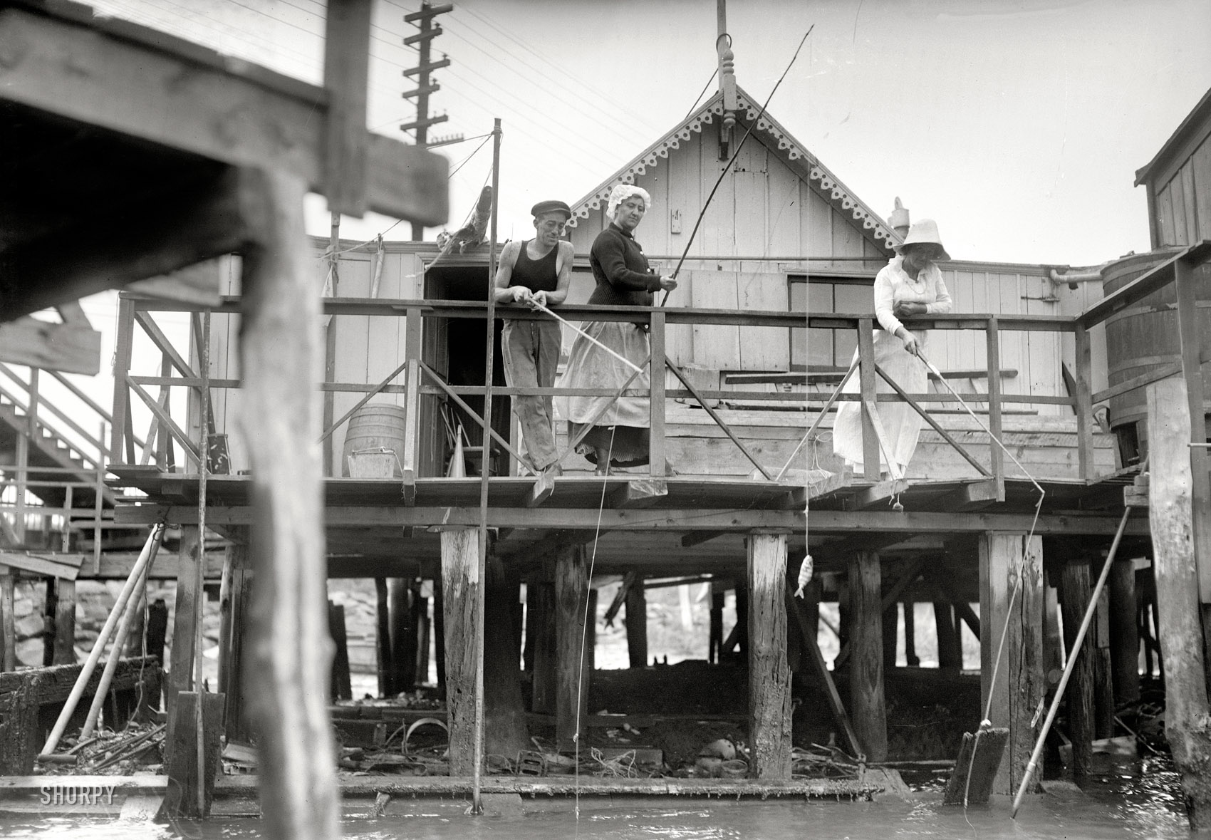 Queens County, New York, circa 1915. "At Broad Channel -- fishing at your front door." 5x7 glass negative, George Grantham Bain Collection. View full size.