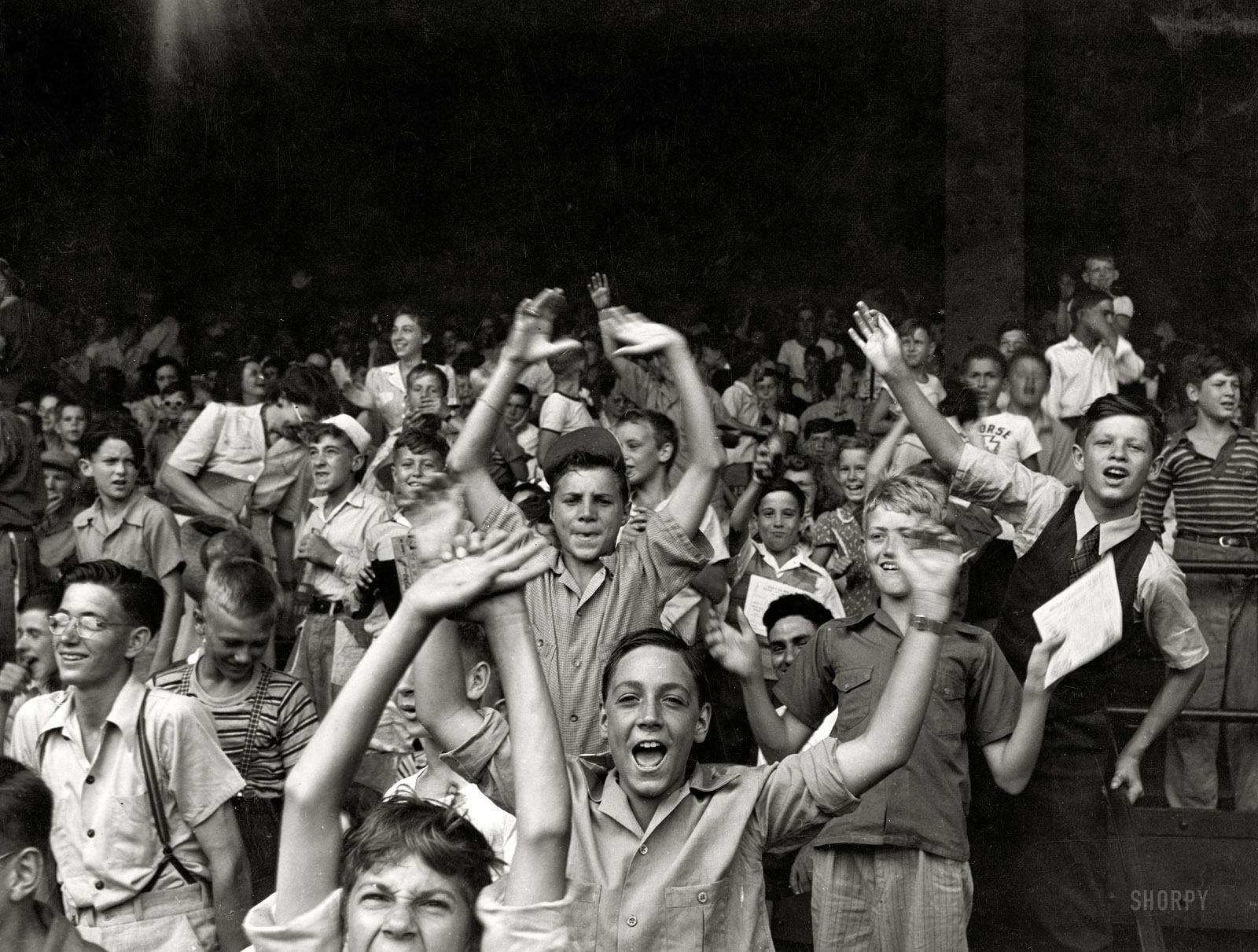 August 1942. Detroit, Michigan. "Kids at ballgame, Briggs Stadium." Photo by John Vachon for the Office of War Information. View full size.
