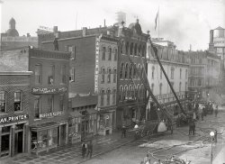 October 23, 1915. Washington, D.C. "Bedell fire, Seventh & D streets." Bedell Manufacturing made mattresses. Three years after a fire in 1912, R.P. Andrews Paper has vacated its D Street premises, but the block still seems unusually combustible. National Photo Company Collection glass negative. View full size.