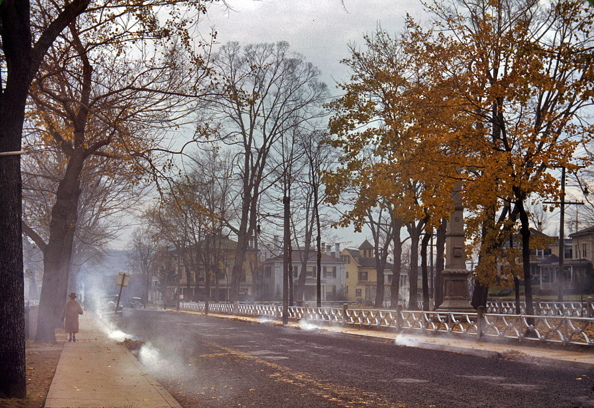 November 1940. Burning autumn leaves along Broadway in Norwich, Connecticut. View full size. 35mm Kodachrome transparency by Jack Delano.