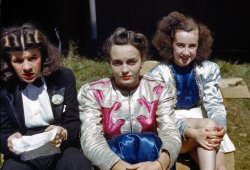 "Backstage" at the girlie show at the Vermont state fair, Rutland. September 1941. View full size. 35mm Kodachrome transparency by Jack Delano.