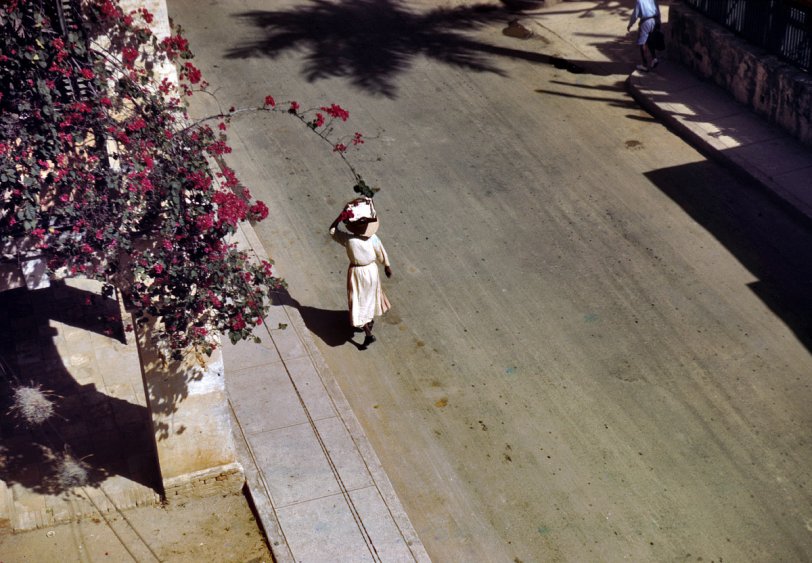 December 1941. "Street scene, Christiansted, St. Croix, Virgin Islands." 35mm Kodachrome transparency by Jack Delano for the FSA. View full size.