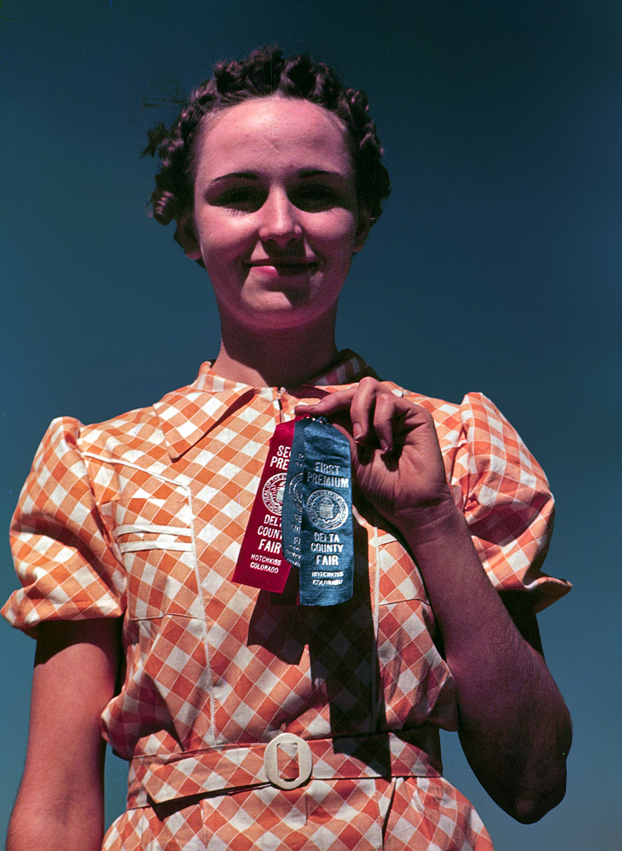 October 1940. "Winner at the Delta County Fair" in Colorado. 35mm Kodachrome transparency by Russell Lee, Farm Security Administration. View full size.