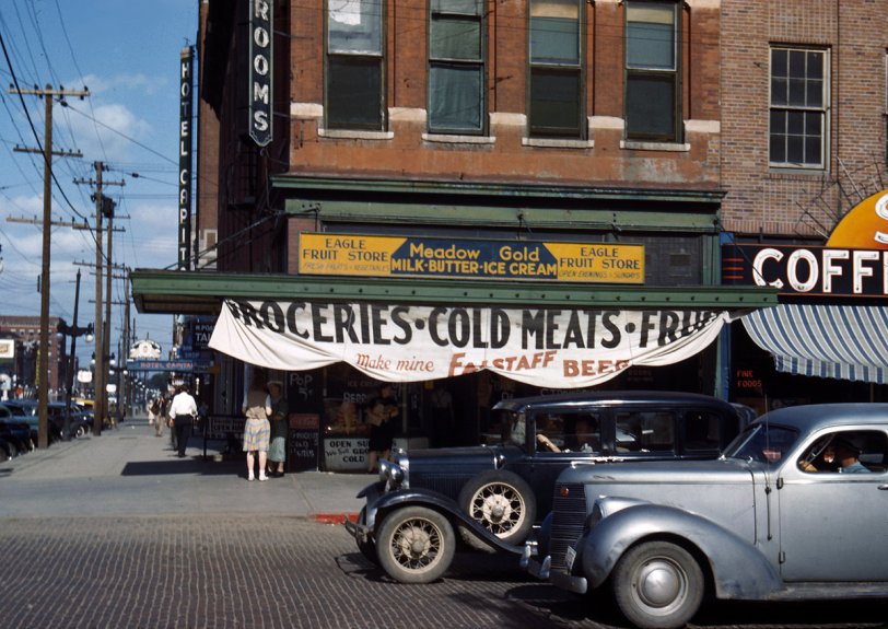 Eagle Fruit Store and Capital Hotel at 10th and P, Lincoln, Nebraska. 1942. 35mm Kodachrome transparency by John Vachon.  View full size.