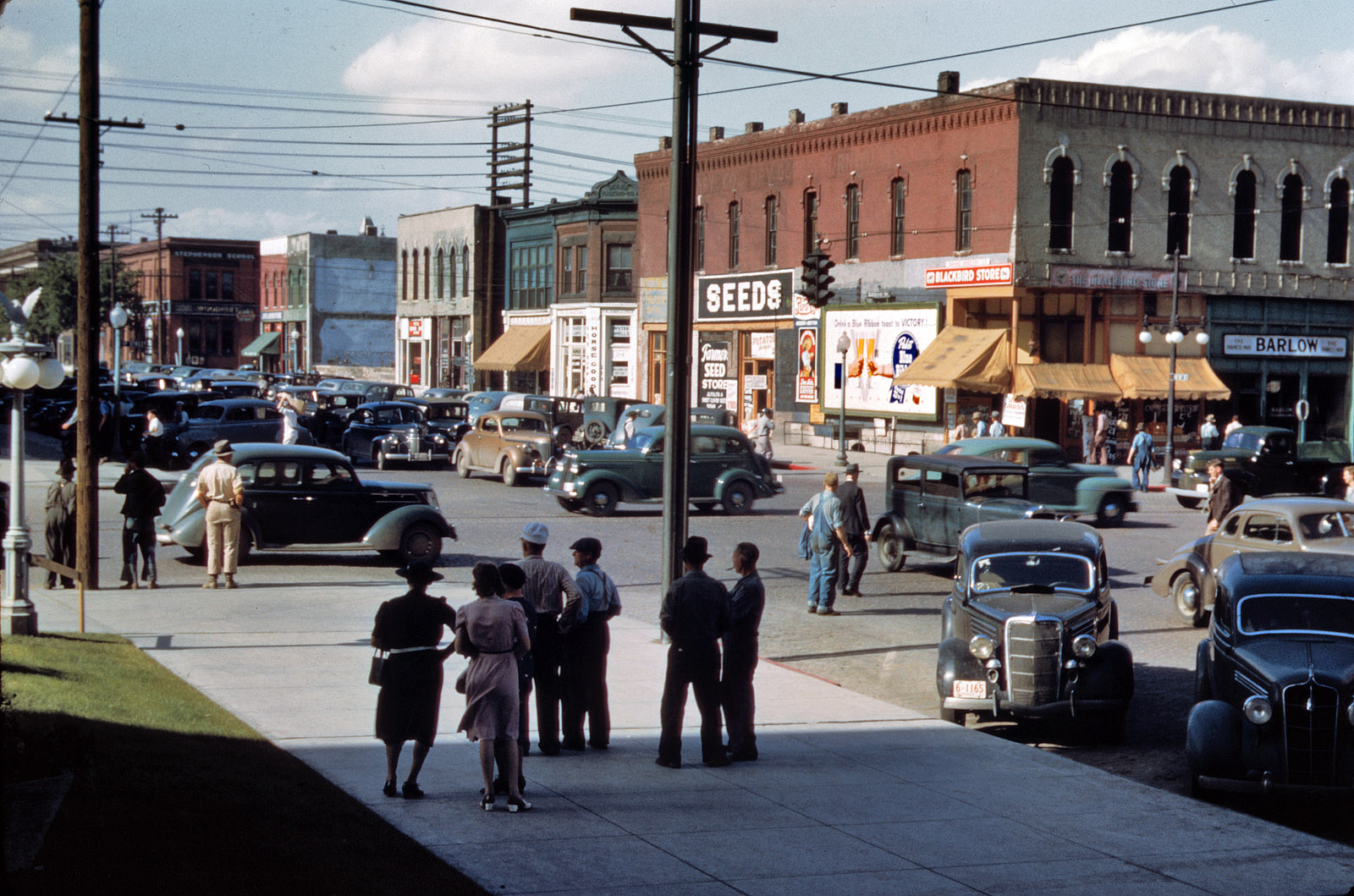 "Seed and feed store in Lincoln, Nebraska." Our third view of the Grand Grocery from 1942. View full size. Kodachrome transparency by John Vachon, OWI.