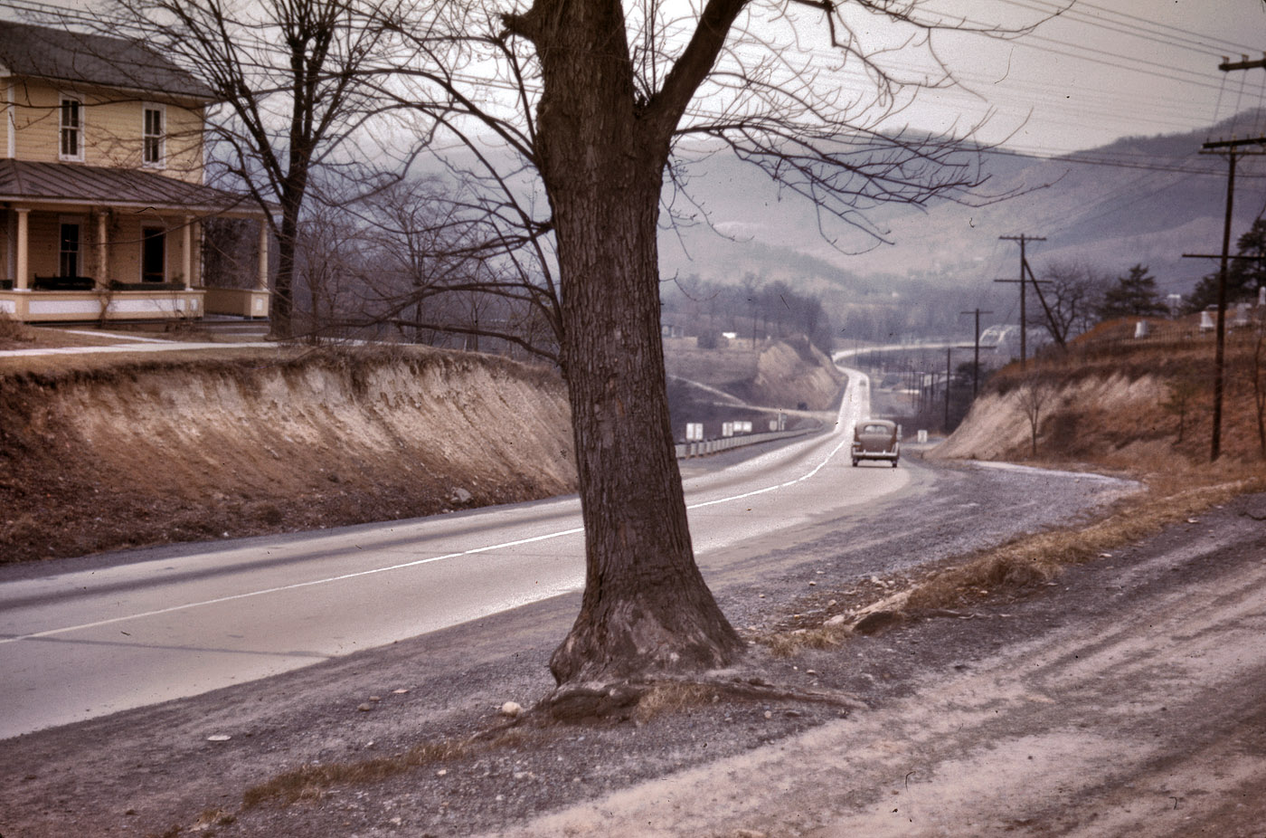 1942. "Road out of Romney, West Virginia." 35mm color transparency by John Vachon for the Office of War Information. View full size.
