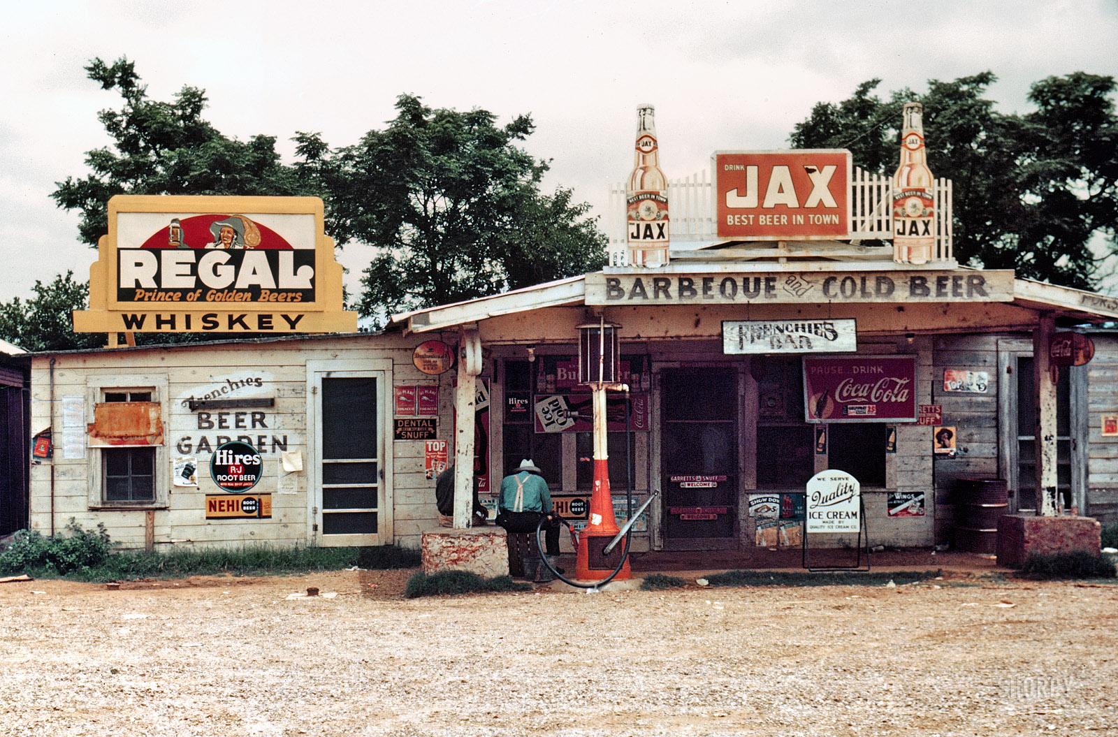 June 1940. Melrose, Louisiana. "A crossroads store, bar, 'juke joint' and gas station in the cotton plantation area." 35mm color transparency by Marion Post Wolcott for the Farm Security Administration.  View full size.