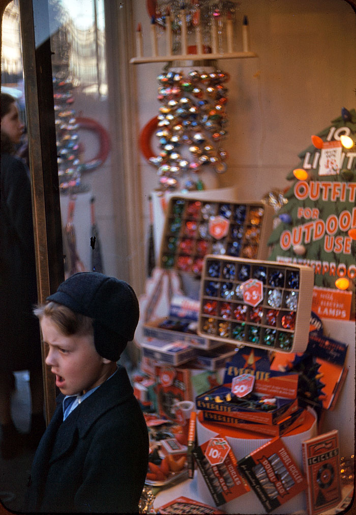 A Christmas window display in 1941 or 1942, photographer unknown. 35mm Kodachrome transparency, Farm Security Administration. View full size.