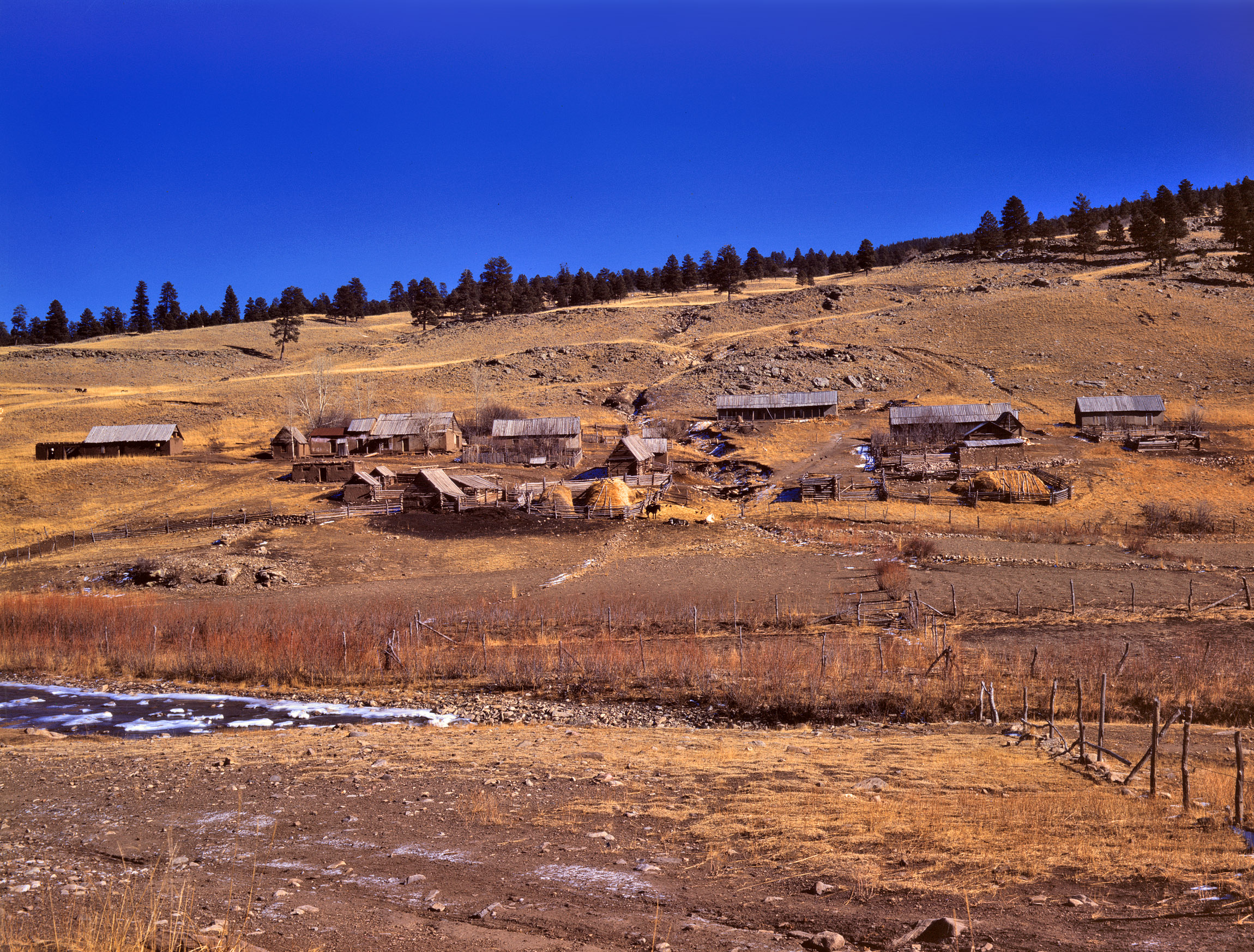 Spring 1943. "Romeroville, near Chacon, New Mexico." View full size. 4x5 Kodachrome transparency by John Collier for the Office of War Information.