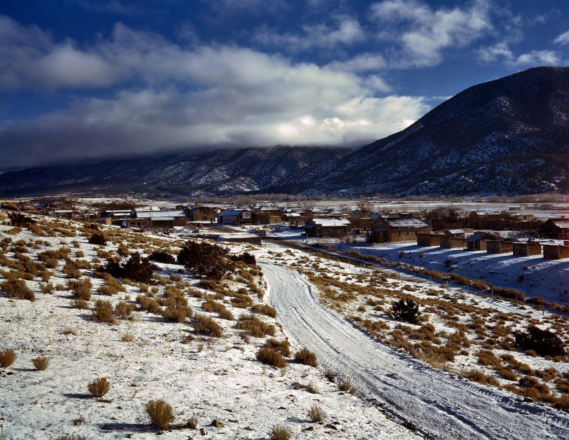 Spring 1943. The town of Questa in Taos County, New Mexico. View full size. 4x5 Kodachrome transparency by John Collier, Farm Security Administration.
