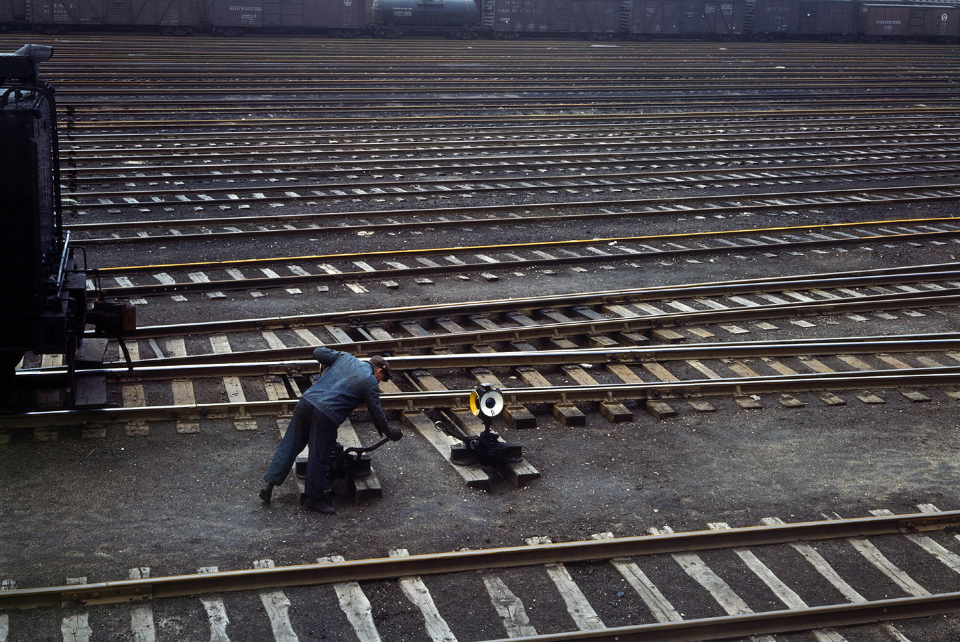 Switchman at the Chicago & Northwestern R.R. Proviso Yard, Chicago. April 1943. View full size. 4x5 Kodachrome transparency by Jack Delano.