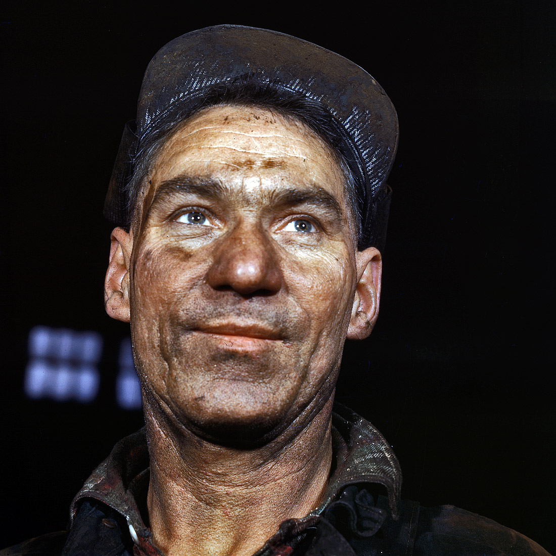 December 1942. Melrose Park, Illinois. Roy Nelin, a box packer in the Proviso Yard roundhouse of the Chicago & North Western R.R. View full size. 4x5 Kodachrome transparency by Jack Delano for the Office of War Information.