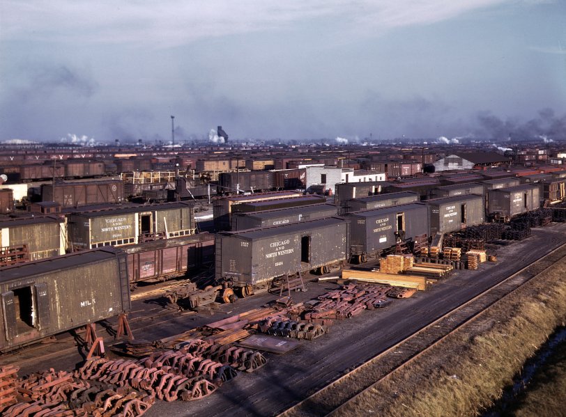 December 1942. Boxcars being refurbished. "Regular tracks of the South Yards of the Chicago &amp; North Western R.R. Proviso Yard." View full size. 4x5 Kodachrome transparency by Jack Delano for the Office of War Information.

