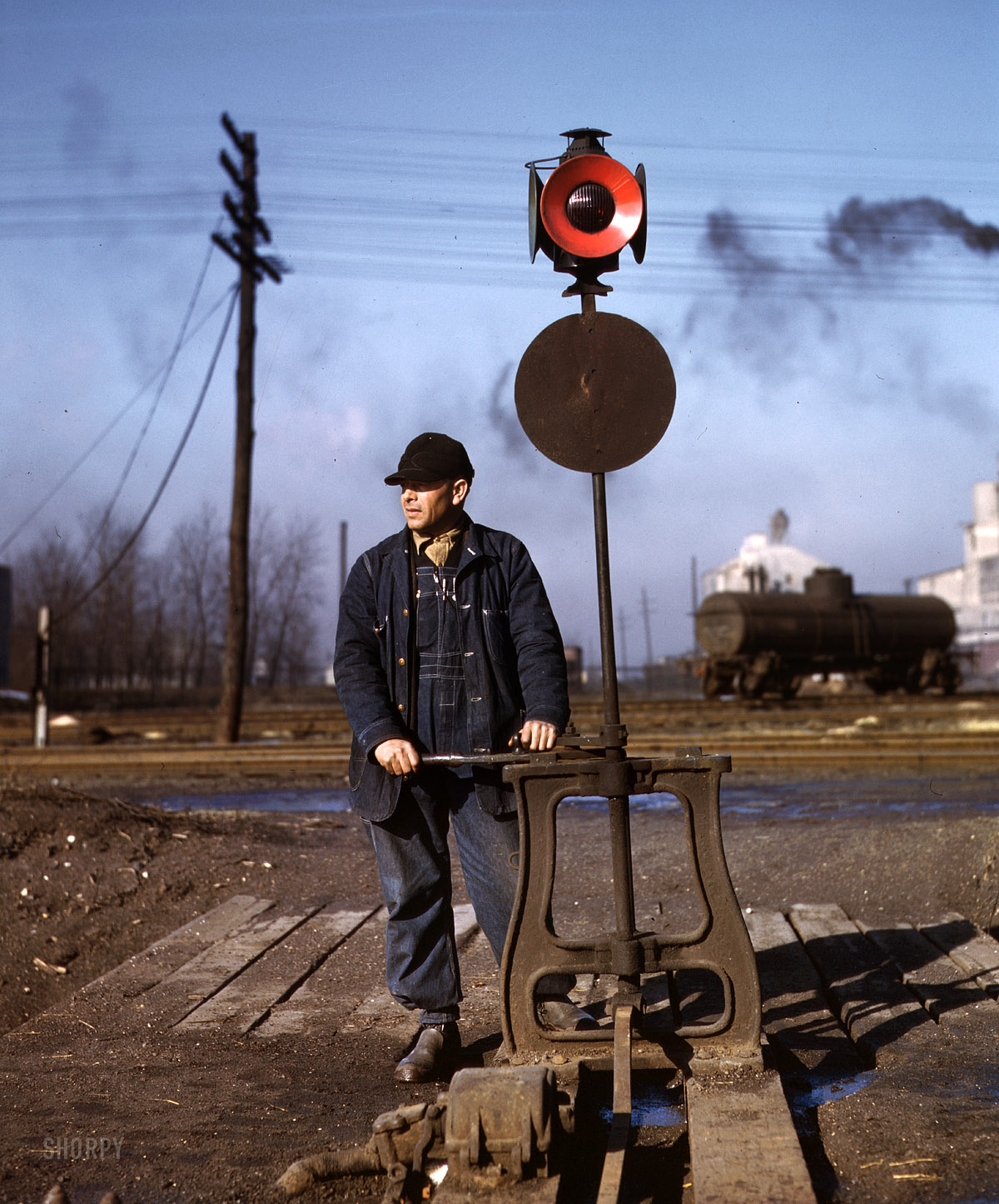 February 1943. "Daniel Senise throwing a switch in an Indiana Harbor Belt Line railyard." 4x5 Kodachrome transparency by Jack Delano. View full size.