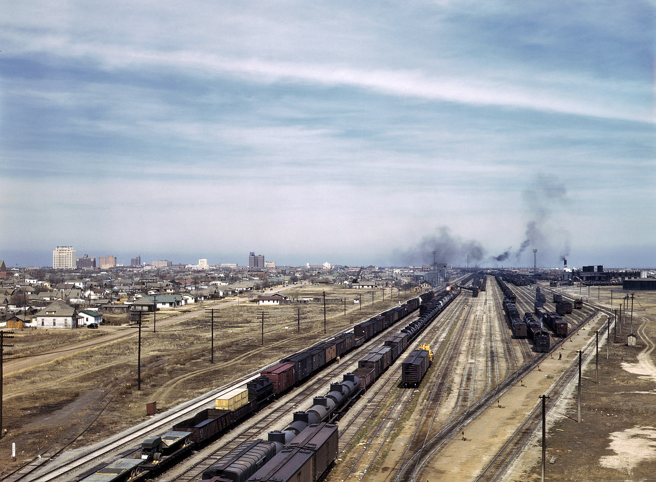 Amarillo, Texas, in March 1943. "General view of the city and the Atchison, Topeka, and Santa Fe Railroad." View full size | Or even bigger. 4x5 Kodachrome transparency by Jack Delano. More Amarillo here and here.