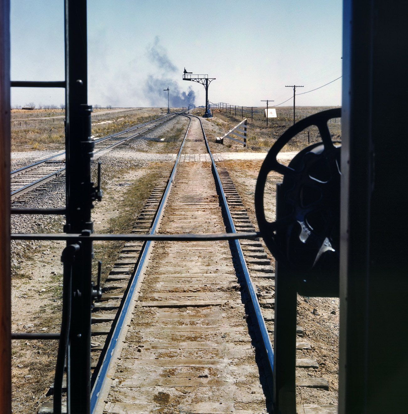 March 1943. Melrose, New Mexico. Chicago to California trip. "Santa Fe R.R. train." View full size. 4x5 Kodachrome transparency by Jack Delano.
