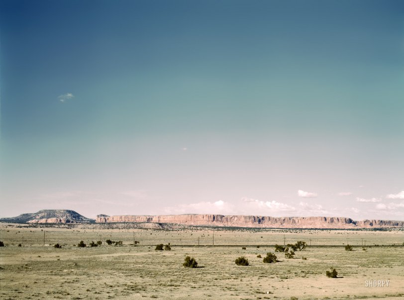 March 1943. "Eastbound track of the Santa Fe R.R. across desert country near South Chaves, New Mexico." 4x5 Kodachrome transparency by Jack Delano for the Office of War Information. View full size.
