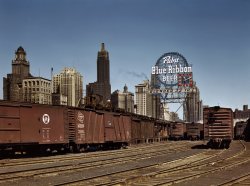 April 1943. South Water Street Illinois Central Railroad freight terminal, Chicago. View full size. 4x5 Kodachrome transparency by Jack Delano for the Office of War Information. Another view of the big Pabst sign against the Chicago skyline.