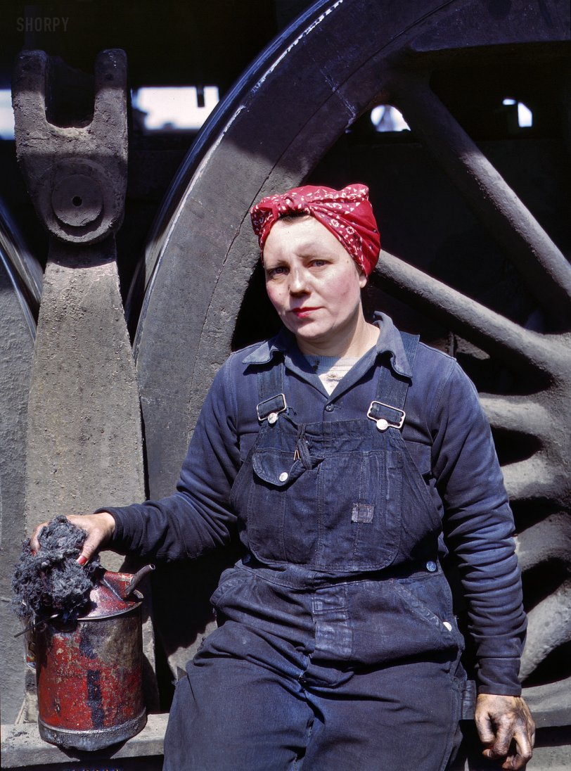 April 1943. Clinton, Iowa. "Mrs. Marcella Hart, mother of three, employed as a wiper at the roundhouse. Chicago & North Western R.R." 4x5 Kodachrome transparency by Jack Delano for the Office of War Information. View full size.