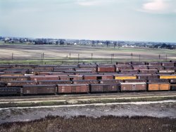 May 1943. Bensenville, Illinois. "C. M. St. P. & P. R.R. [Chicago, Milwaukee, St. Paul & Pacific Railroad], general view of part of the yard." 4x5 Kodachrome transparency by Jack Delano for the Office of War Information. View full size.