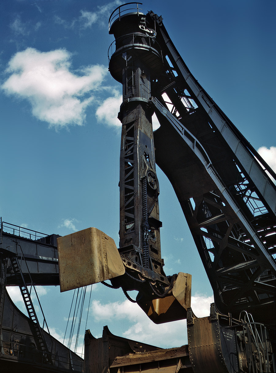 May 1943. A Hulett unloader at the Pennsylvania Railroad ore docks in Cleveland. View full size. 4x5 Kodachrome transparency by Jack Delano.
