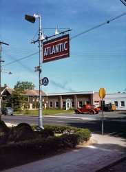 May 1942. Offices of the Southington News in Southington, Connecticut. 3x4 Kodachrome transparency by Fenno Jacobs for the OWI. View full size. After researching this post we find that stop signs in the U.S. were yellow until 1954.