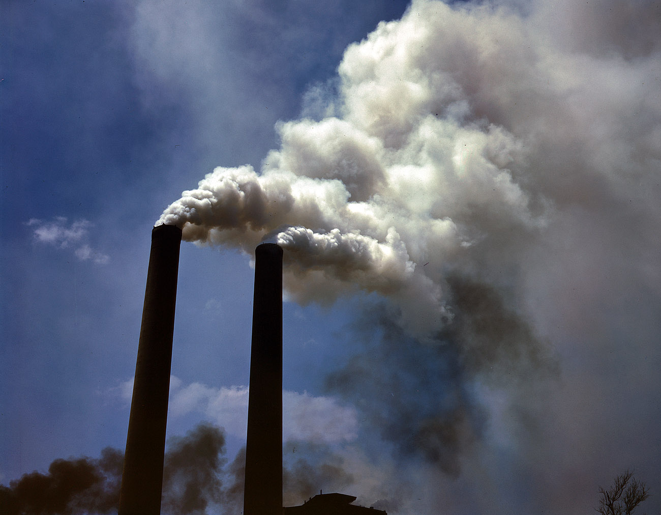 One of a series of chemical-plant smokestacks photographed by Alfred Palmer in Muscle Shoals, Alabama, and Akron, Ohio, in 1942. View full size. 4x5 Kodachrome transparency for the Office of War Information.
