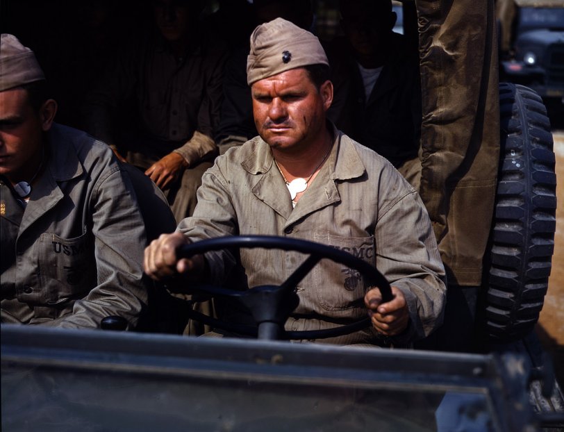 May 1942. Marine transport driver at New River, North Carolina. View full size. 4x5 Kodachrome transparency by Alfred Palmer, Office of War Information.
