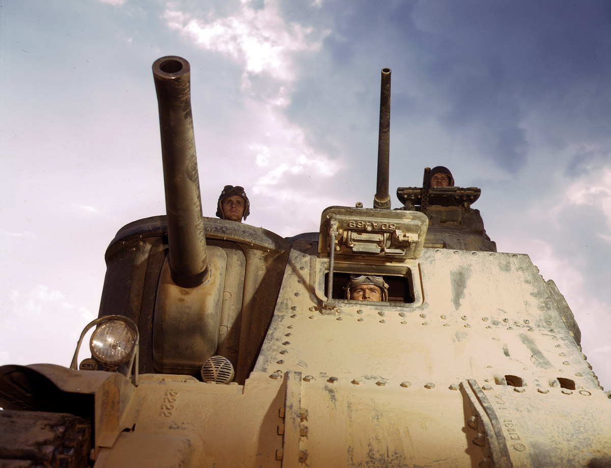 June 1942. M-3 tank and crew at Fort Knox, Kentucky. View full size. 4x5 Kodachrome transparency by Alfred Palmer for the Office of War Information.