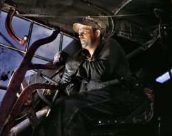 June 1942. Crane operator at Tennessee Valley Authority's Douglas Dam. 4x5 Kodachrome transparency by Alfred Palmer for the OWI. View full size.