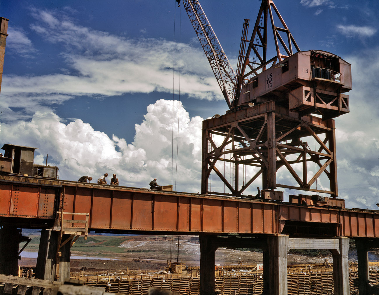June 1942. Crane at the Tennessee Valley Authority's Douglas Dam. View full size. 4x5 Kodachrome transparency by Alfred Palmer. An amazing photograph.