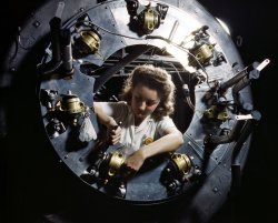 B-25 bomber cowl assembly, North American Aviation, Kansas City, Kansas. October 1942. View full size. 4x5 Kodachrome transparency by Alfred Palmer.