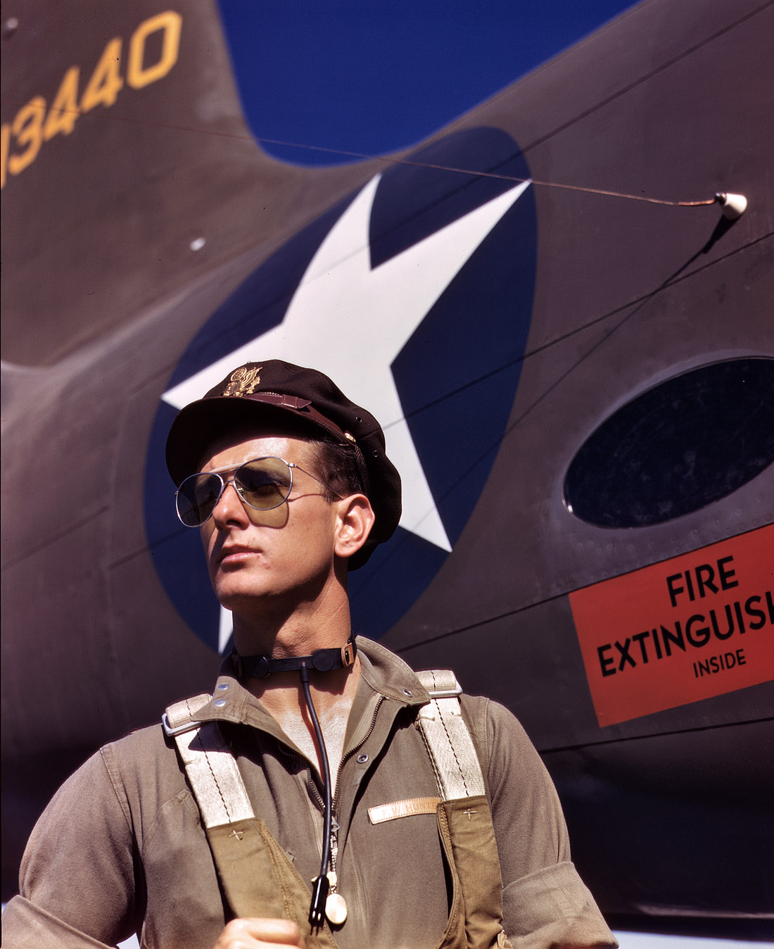 October 1942. F.W. Hunter, Army test pilot, at the Douglas Aircraft plant in Long Beach, Calif. View full size. 4x5 Kodachrome transparency by Alfred Palmer.