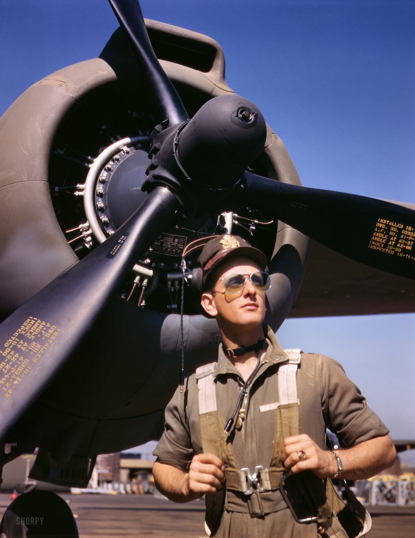 October 1942. "Lieutenant 'Mike' Hunter, Army test pilot assigned to Douglas Aircraft Company, Long Beach, California." 4x5 Kodachrome transparency by Alfred Palmer for the Office of War Information. View full size.