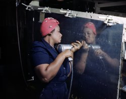 February 1943. Working on a "Vengeance" dive-bomber at Vultee-Nashville. 4x5 Kodachrome transparency by Alfred Palmer for the Office of War Information. View full size. 
