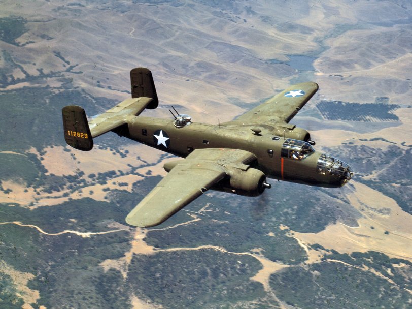 October 1942. North American Aviation B-25 medium bomber 41-12823 over the mountains near Inglewood, California. 4x5 Kodachrome transparency by Mark Sherwood for the Office of War Information. View full size.
